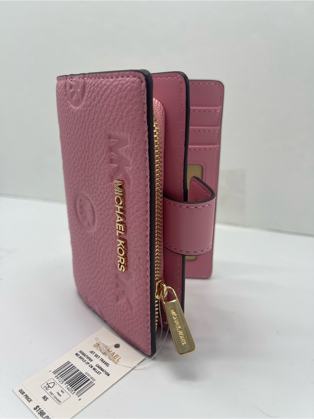 Michael KORS Jet Set Travel Md Zip CN Logo Debossed Bifold Wallet
Carnation 
NWT - Picture 10 of 16